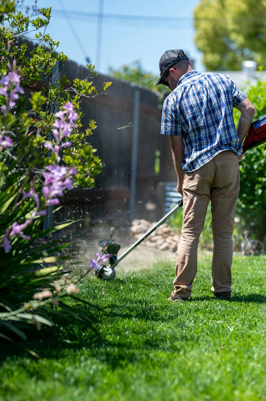 A landscaper at work on a sunny day